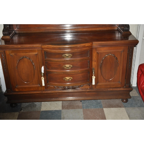 161 - WALNUT MIRROR BACK SIDEBOARD WITH PILLAR SUPPORT, OVAL BEVEL EDGE MIRROR AND BOWED DOORS TO BASE, ON... 