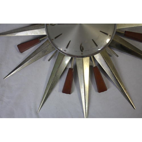 101 - METAMEC SUNBURST CLOCK - 2 PIECES OF TEAK MISSING