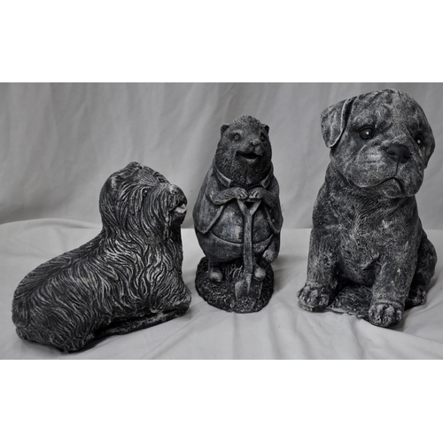 43 - 3 GARDEN ORNAMENTS - DOG WITH A BOW, 1 ROTTWELIER PUPPY AND 1 HEDGEHOG