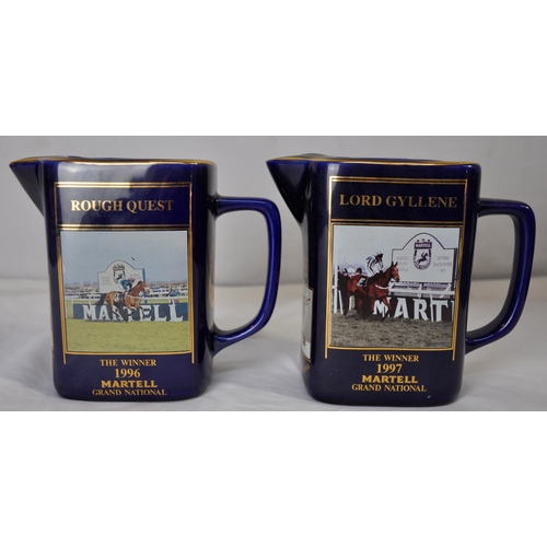 99 - 8 MARTELL GRAND NATIONAL WATER JUGS 1992 - 1999 (ONE DAMAGED)