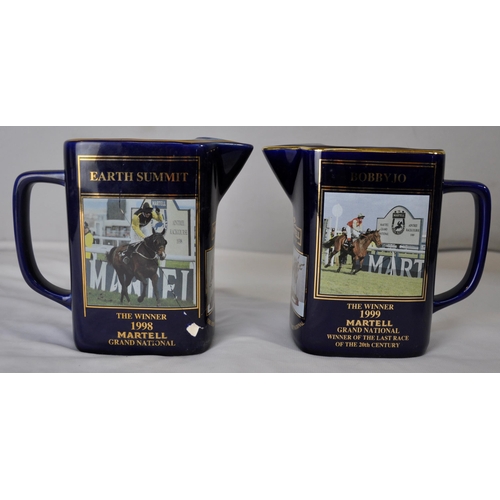 99 - 8 MARTELL GRAND NATIONAL WATER JUGS 1992 - 1999 (ONE DAMAGED)