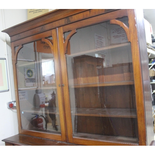 128 - GLAZED DOOR BOOKCASE ON CUPBOARD BASE 5'4