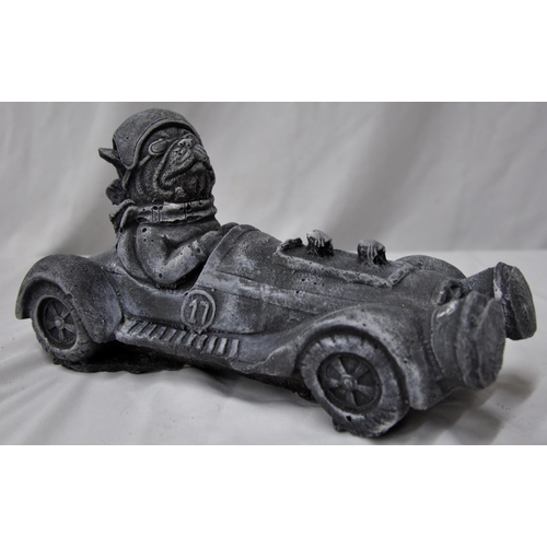 147 - 4 GARDEN ORNAMENTS - SEE NO EVIL MONKEY, SLEEPY DRAGON, DOG WITH A BOW AND DOG IN A RACE CAR