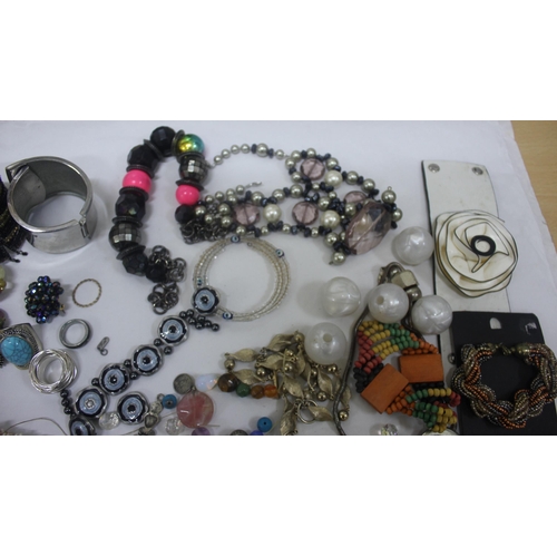 335 - BOX OF COSTUME JEWELLERY