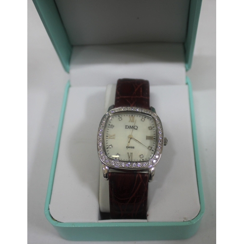 352 - 2 LADIES WATCHES: BOXED GOSSIP WITH CIRCLE DESIGN STRAP & NEW BOXED DMQ STONE SET WATCH ON BROWN... 