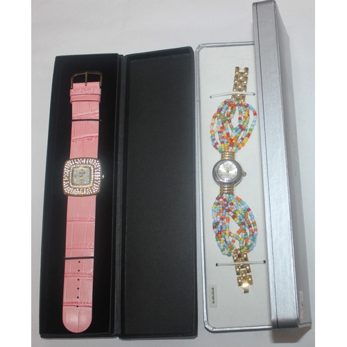 387 - 2 NEW & BOXED LADIES WATCHES: SUZIE B STONE SET WATCH ON PINK LEATHER STRAP & MARCEL DRUCKER... 