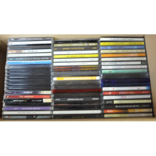 56 - 3 BOXES OF CDS AND CASSETTES PLUS 2 VINYL SINGLES