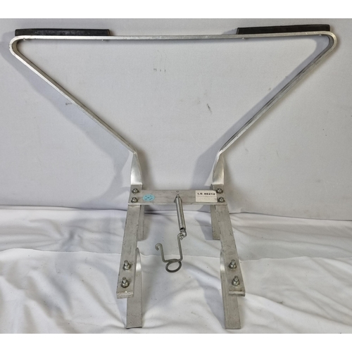 70 - LADDER STAY AND 2 PAIR OF ROOF CLAMPS