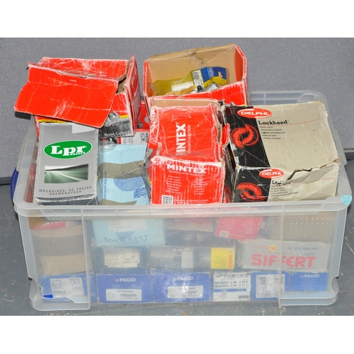 141 - 2 CONTAINERS OF CAR PARTS - BRAKE PADS, STEERING GAITER KITS