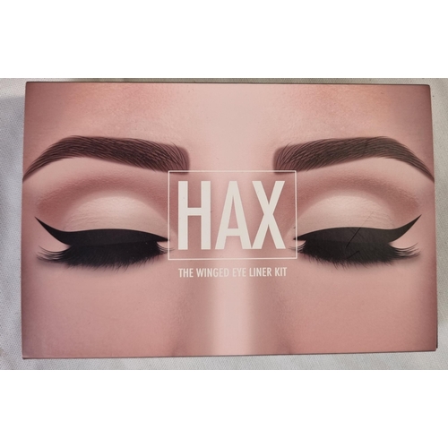 174 - 32 HAX 'THE WINGED EYE LINER KITS' NEW AND SEALED AND 1 INCOMPLETE AND OPEN