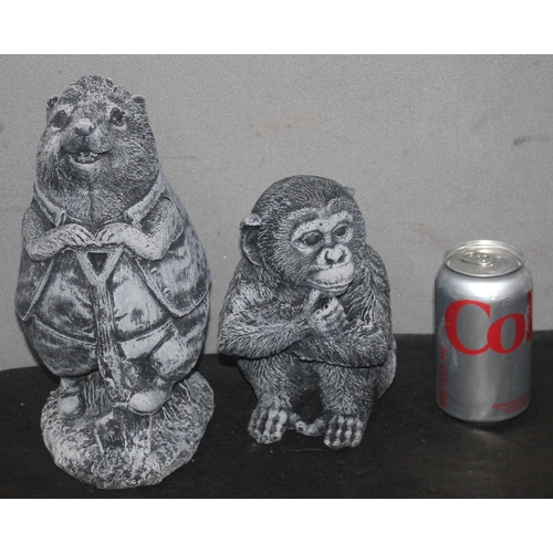 34 - 2 GARDEN ORNAMENTS - 1 CHIMPANZEE AND 1 HEDGEHOG