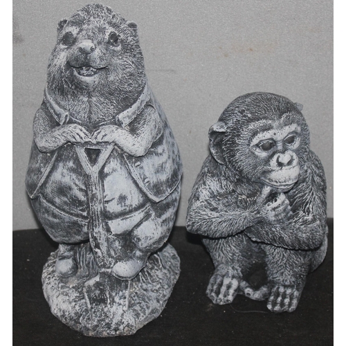 34 - 2 GARDEN ORNAMENTS - 1 CHIMPANZEE AND 1 HEDGEHOG