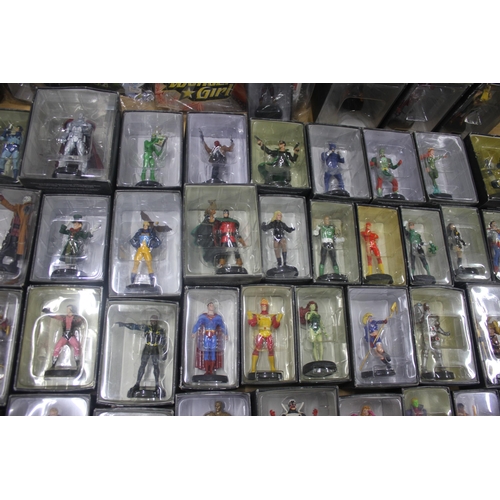 36 - 2 DC COMICS WITH FIGURES AND BOX OF DC CHARACTER FIGURES