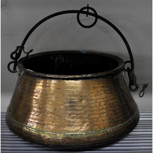 89 - BRASS COOKING POT AND CAST IRON CASSEROLE DISH