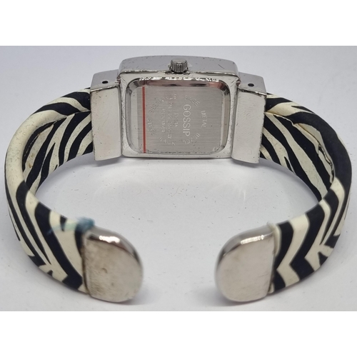 102 - NEW BOXED 'GOSSIP' WATCH ON ZEBRA PATTERNED BANGLE AND NEW BOXED 'GOSSIP' YELLOW FACED STONE SET WAT... 