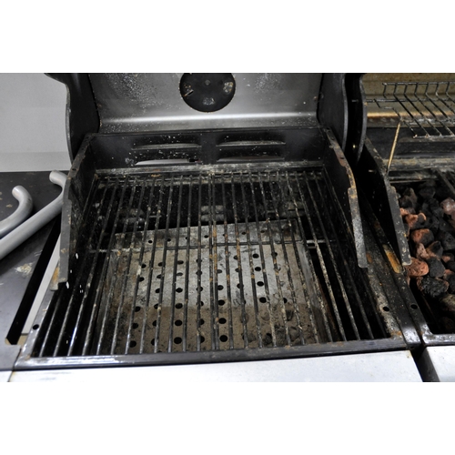 307 - OUTBACK COMBI CHARCOAL AND GAS 4 BURNER  BBQ - HANDLES AND 1 SIDE TABLE NEED RE-ATTACHING