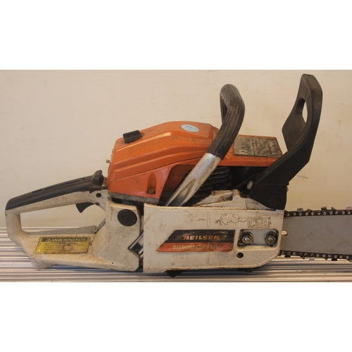 310 - NEILSEN PETROL CHAIN SAW - PETROL ITEM SOLD AS VIEWED