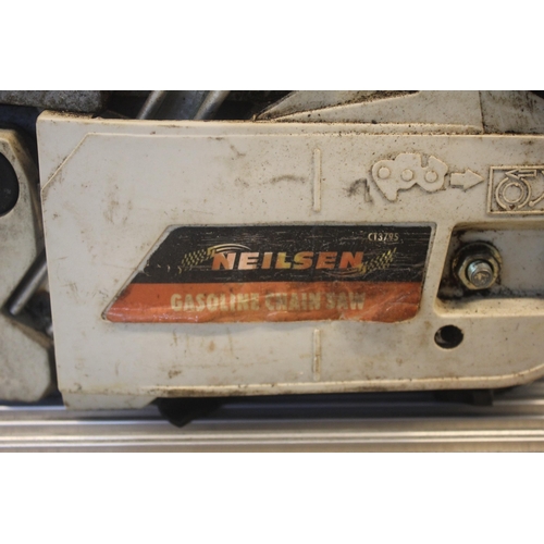 310 - NEILSEN PETROL CHAIN SAW - PETROL ITEM SOLD AS VIEWED