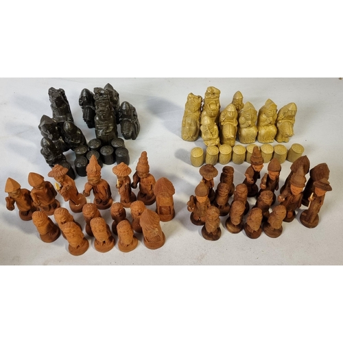 59 - 2 CHESS SETS: WEST EUROPE IMITATION MEDIEVAL RESIN & NIGERIAN ACACIA THORN