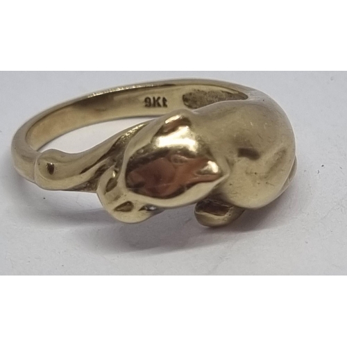 407 - YELLOW METAL COUGAR DESIGN RING - MARKED 9kt  (SIZE O) (4.2g)