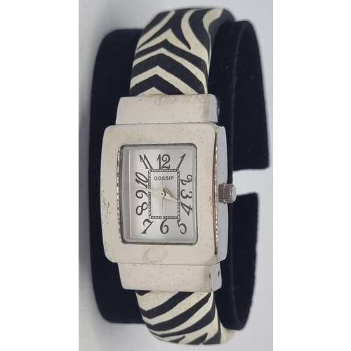 102 - NEW BOXED 'GOSSIP' WATCH ON ZEBRA PATTERNED BANGLE AND NEW BOXED 'GOSSIP' YELLOW FACED STONE SET WAT... 