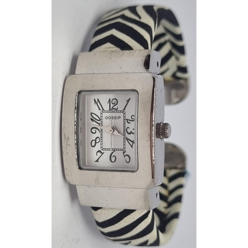 102 - NEW BOXED 'GOSSIP' WATCH ON ZEBRA PATTERNED BANGLE AND NEW BOXED 'GOSSIP' YELLOW FACED STONE SET WAT... 