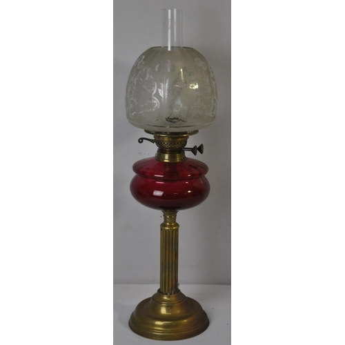 14 - BRASS AND CRANBERRY GLASS OIL LAMP