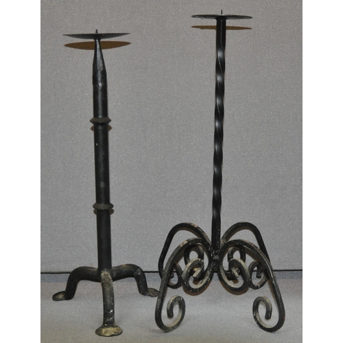 48 - 2 IRON CANDLE HOLDERS. HEIGHT 21