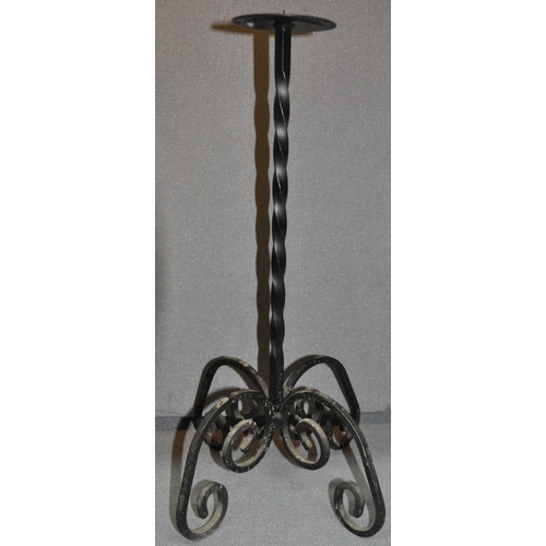 48 - 2 IRON CANDLE HOLDERS. HEIGHT 21