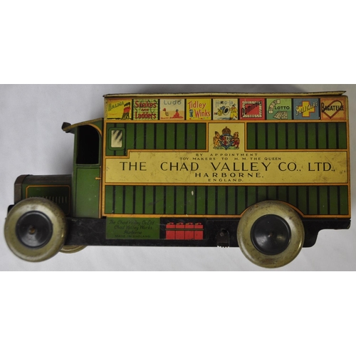 54 - CHAD VALLEY TINPLATE CLOCKWORK GAMES DELIVERY VAN, APPROX LENGTH 25cm PLAY WORN AND SOME RUST. NO KE... 