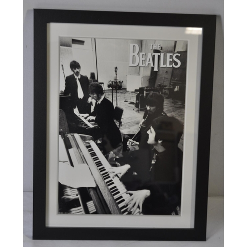 74 - 2 FRAMED PHOTOGRAPHS OF THE BEATLES