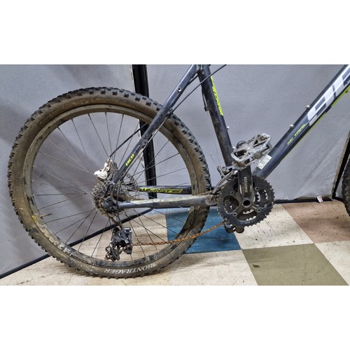 131 - 2 MOUNTAIN BIKES NEEDING REPAIR - SARACEN 24 SPEED AND XC TRAIL 30 SPEED