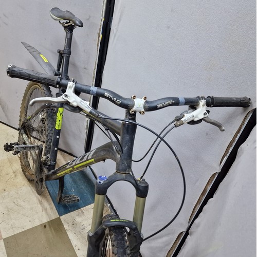 131 - 2 MOUNTAIN BIKES NEEDING REPAIR - SARACEN 24 SPEED AND XC TRAIL 30 SPEED