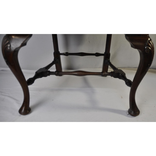 185 - ARMCHAIR WITH INLAID DECORATION TO BACK, SHAPED ARM RESTS ON PAD, FEET TO FRONT SUPPORTS