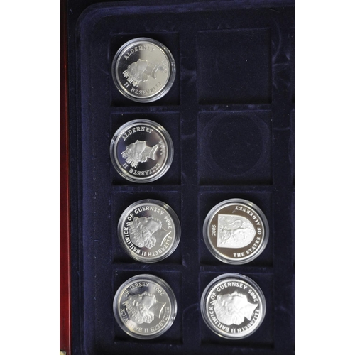 241 - COIN CASE CONTAINING 18 FIVE POUND COINS - THE HISTORY OF THE ROYAL NAVY WITH CERTIFICATES