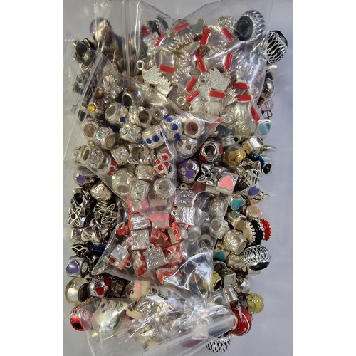 36 - TUB AND BAG OF PENDANTS, CHARMS AND BEADS