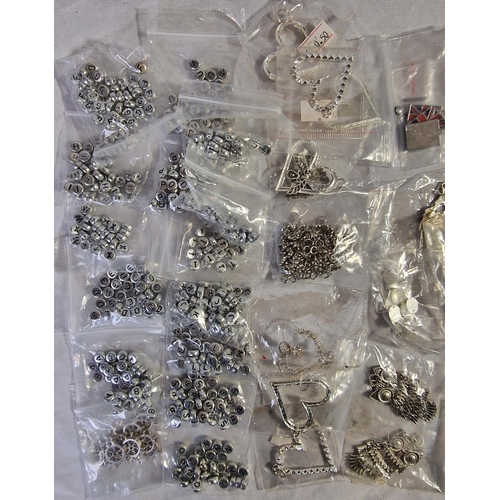 36 - TUB AND BAG OF PENDANTS, CHARMS AND BEADS