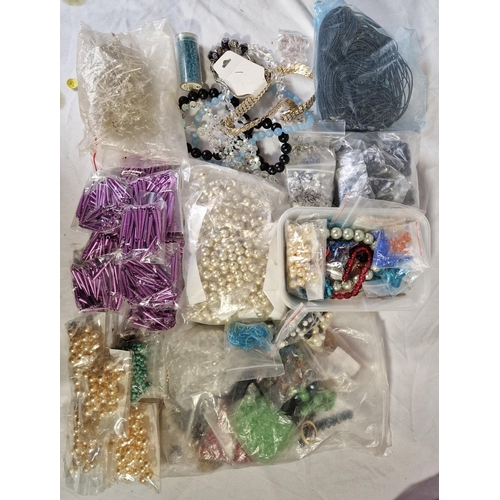 105 - BOX AND 4 TUBS OF BEADS ETC