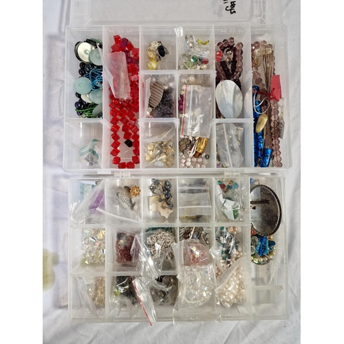 105 - BOX AND 4 TUBS OF BEADS ETC