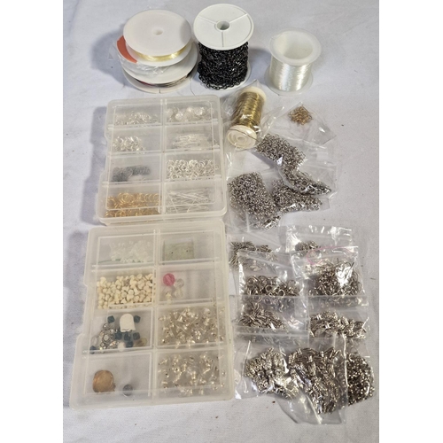 132 - 4 COMPARTMENTED BOXES AND BAG OF JEWELLERY MAKING ACCESSORIES - LINKS, BEADS, EARRING BACKS, CARD, C... 