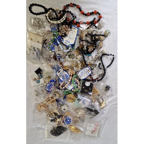 133 - 4 TUBS OF COSTUME JEWELLERY - BROOCHES, NECKLACES, BRACELETS, ETC