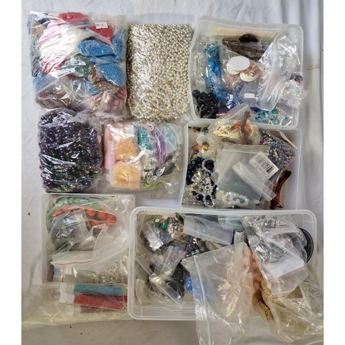 139 - 2 CRATES AND 2 TUBS OF BEADS ETC