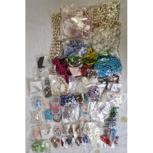 139 - 2 CRATES AND 2 TUBS OF BEADS ETC