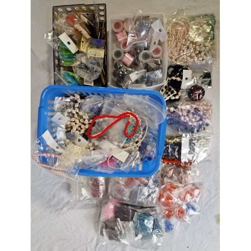 139 - 2 CRATES AND 2 TUBS OF BEADS ETC