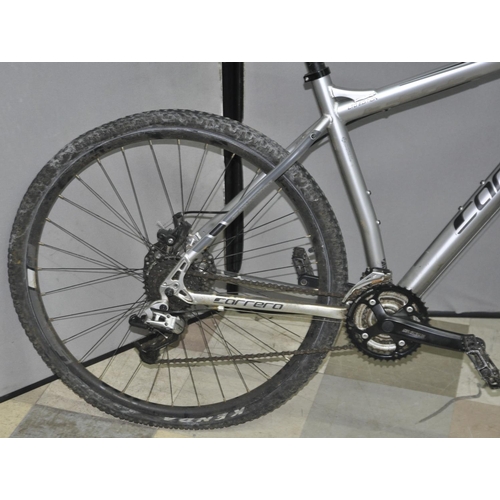 4 - CARRERA HELLCAT 24 SPEED MOUNTAIN BIKE WITH FRONT SHOCKS AND DISC BRAKES 20 INCH FROM CENTRE OF PEDA... 