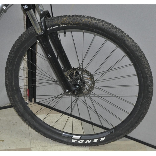 4 - CARRERA HELLCAT 24 SPEED MOUNTAIN BIKE WITH FRONT SHOCKS AND DISC BRAKES 20 INCH FROM CENTRE OF PEDA... 