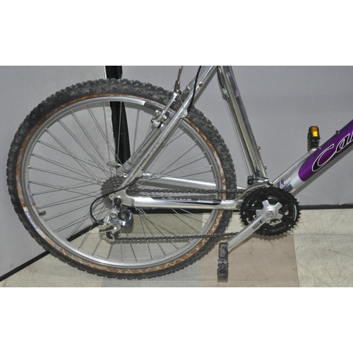 24 - CARRERA GRYPHON 21 SPEED MOUNTAIN BIKE WITH FRONT SHOCKS AND DISC BRAKES - 17INCH BETWEEN CENTRE OF ... 