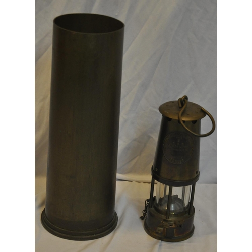 37 - PROTECTOR LAMP AND LIGHTING ECCLES TYPE 6 MINER'S LAMP AND LARGE BRASS SHELL CASING