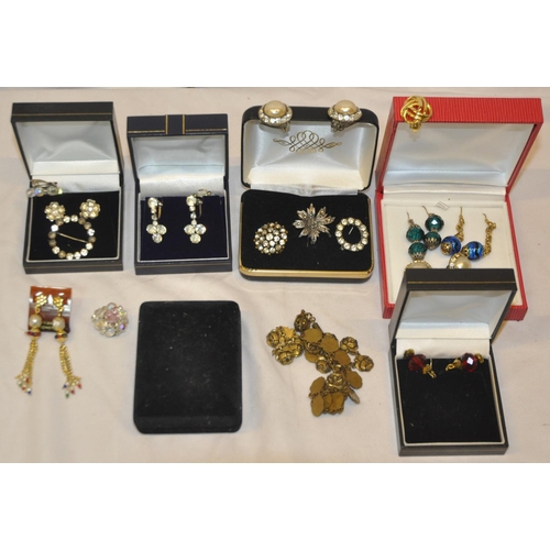 112 - 2 BOXES OF COSTUME JEWELLERY - EARRINGS, BROOCHES, BRACELETS AND NECKLACES