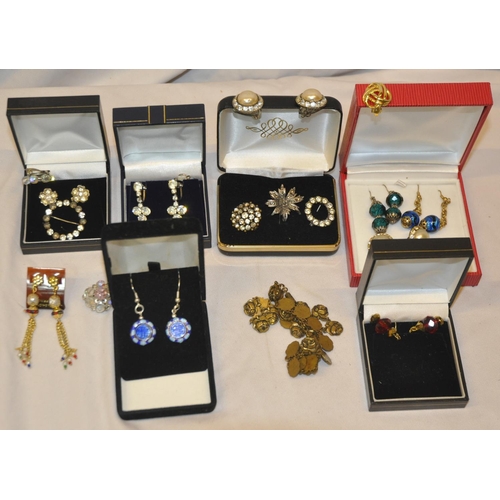 112 - 2 BOXES OF COSTUME JEWELLERY - EARRINGS, BROOCHES, BRACELETS AND NECKLACES